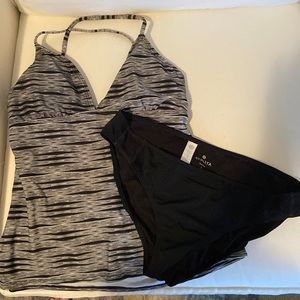 Athleta bathing suit. Size: L. Top: blk/wht/grey. Bottoms:blk w/ mesh on hips.